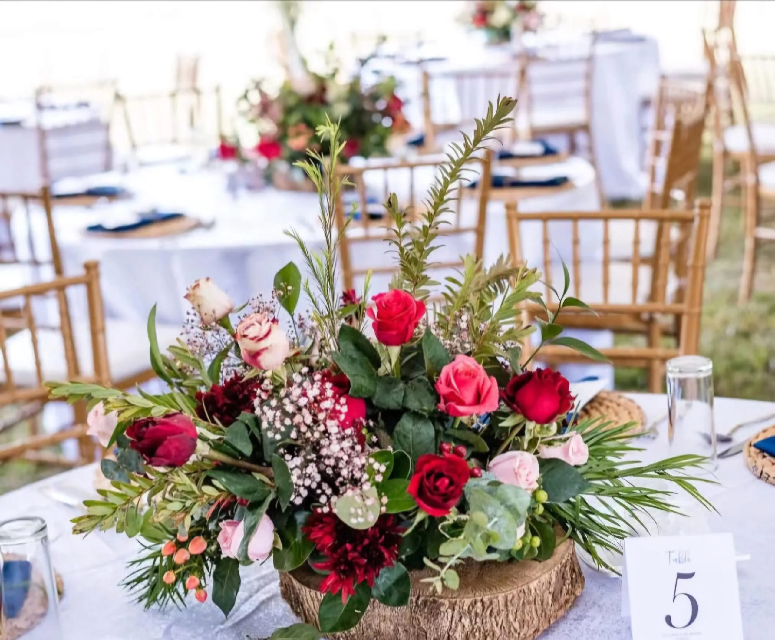 Floral centrepiece and styled banquet table by Ashley’s Events